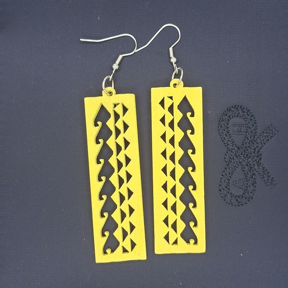 Yellow Wood rectangle earrings hollowed out carved abstract design